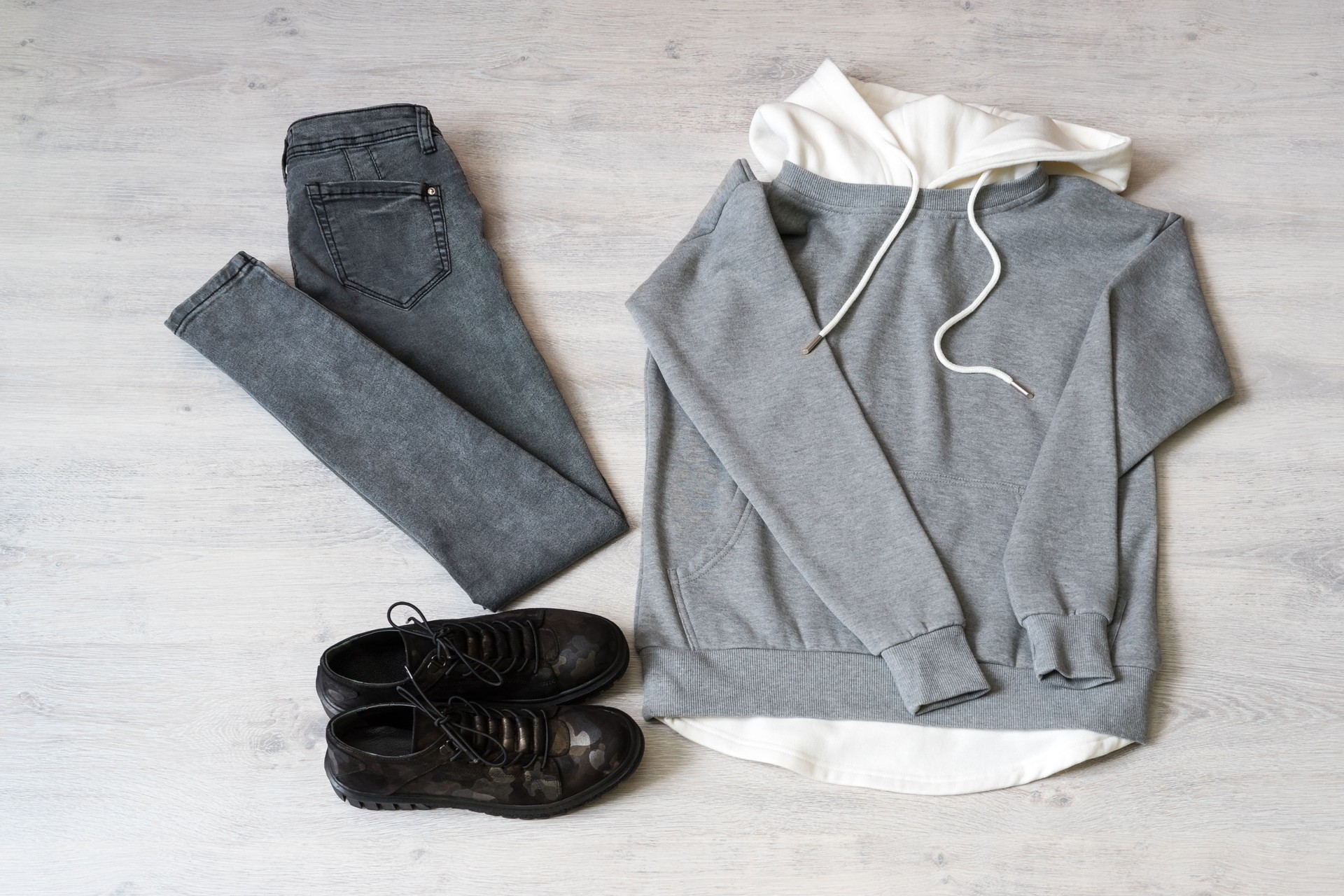 Teen clothing set: grey sweatshirt, black jeans and boots in military style
